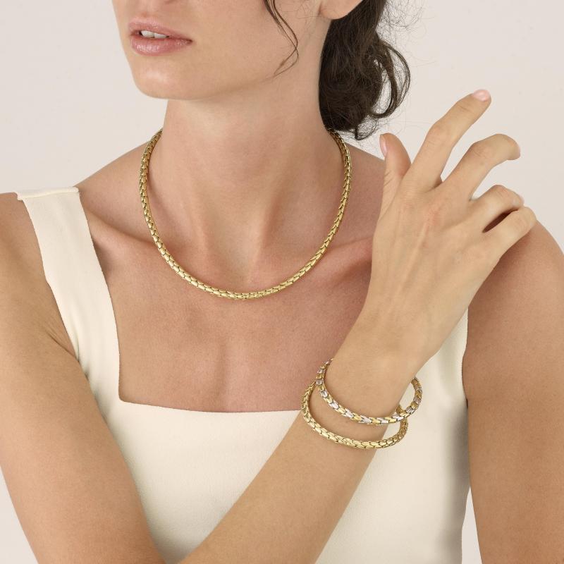 CHIMENTO 18K YELLOW GOLD STRETCH SPRING BRACELET. 